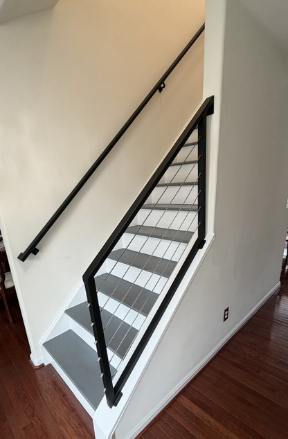 metal stair railing with cables