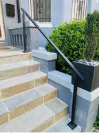 Black metal railing for front steps